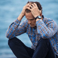 A person pausing during a stressful day